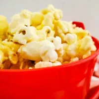 Featured image showing finished cheddar popcorn recipe ready to eat.