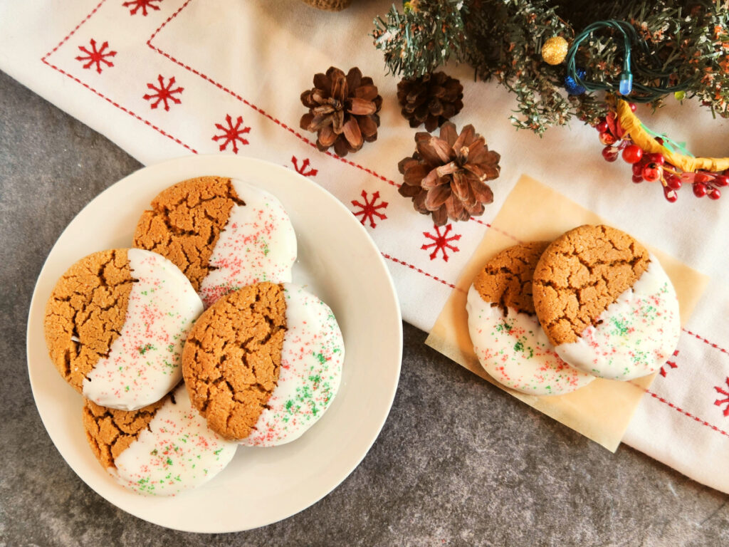 Dipped gingerbread cookies with red and green sprinkles