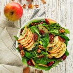 salad with sliced apples and greens