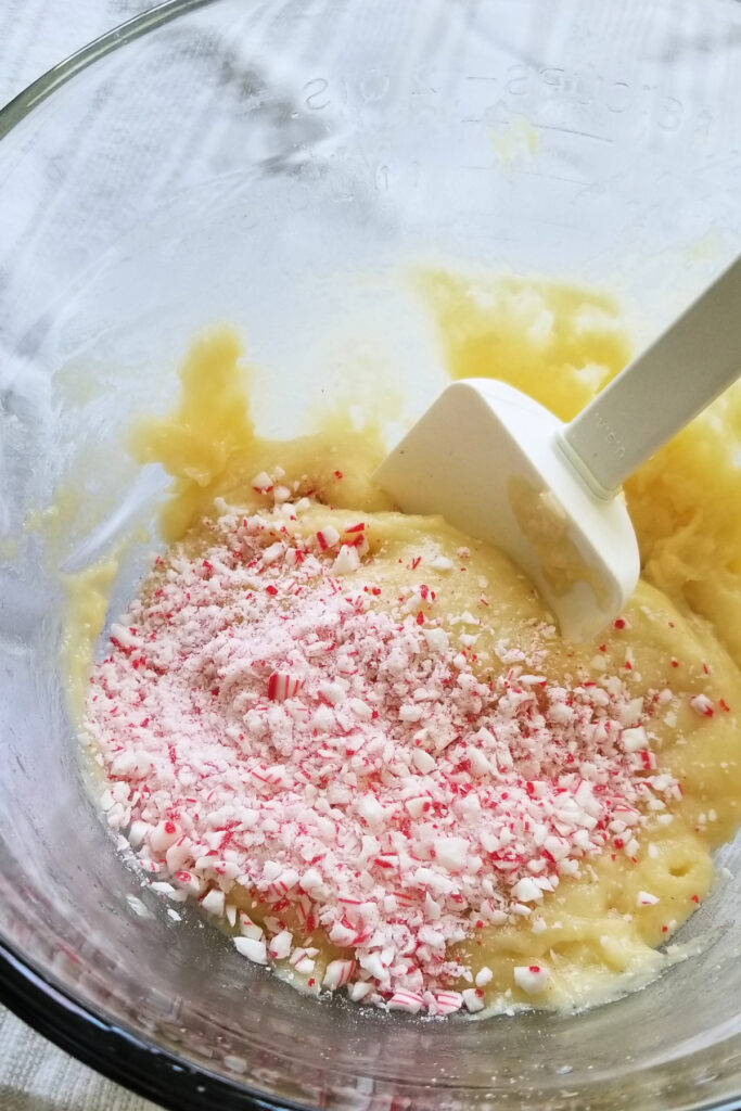 adding peppermint pieces to cake mix batter
