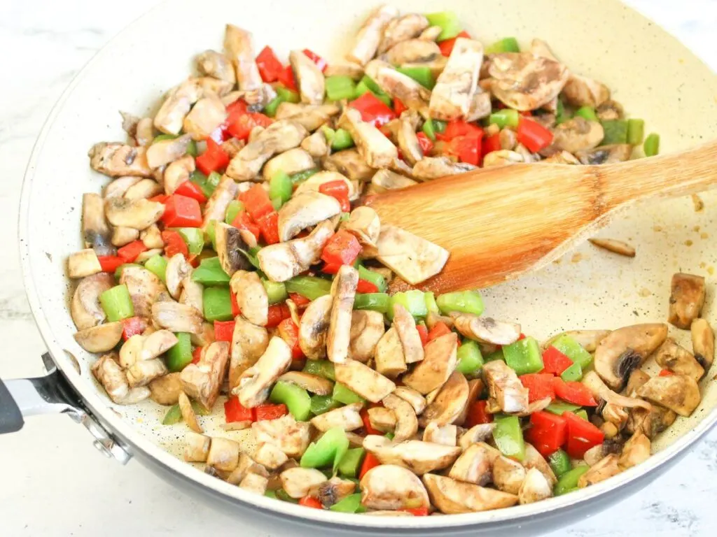 sauteeing vegetables in skillet