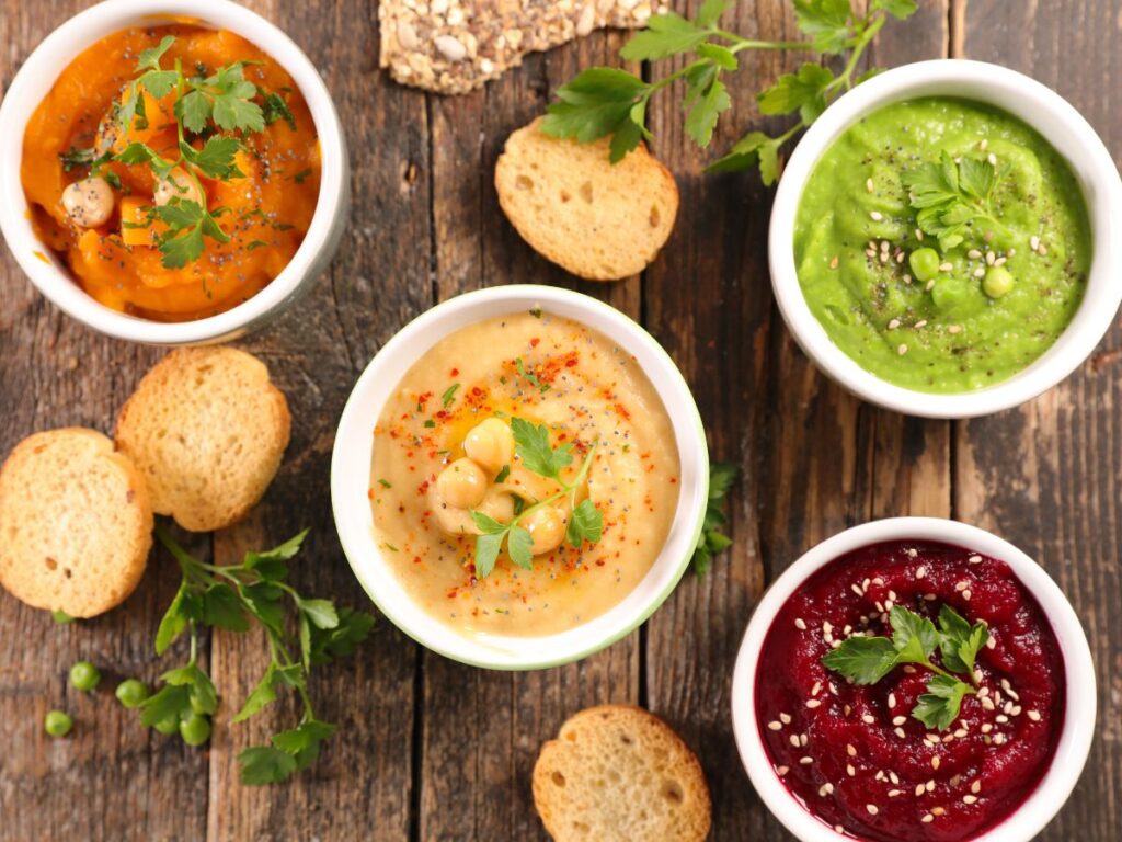 white bowls of dips and spreads