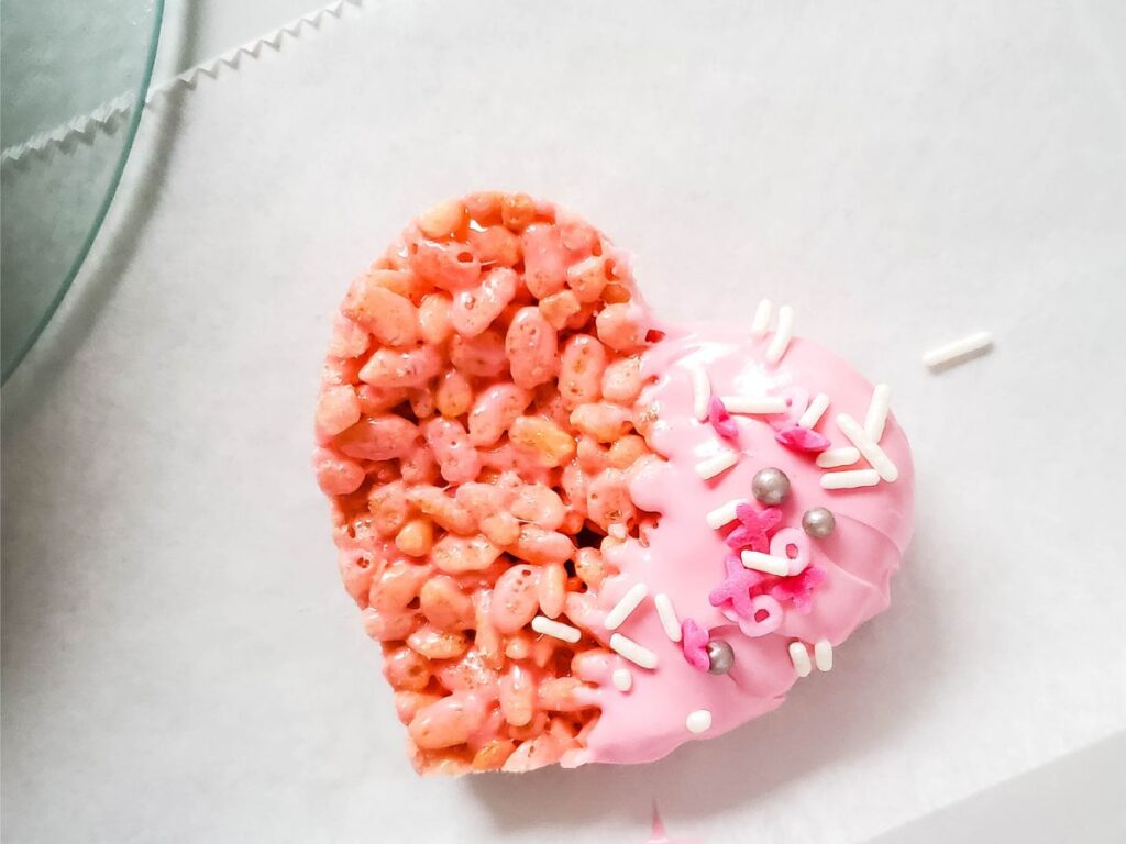 dipped and sprinkled heart rice krispy treat