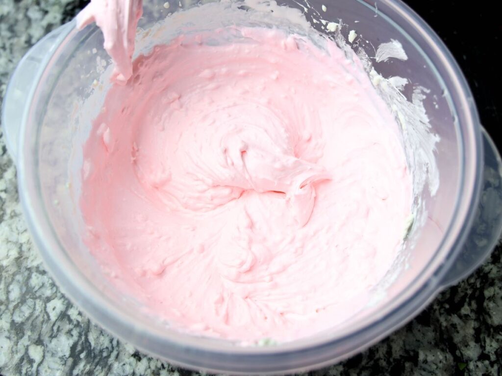 tinted cream cheese in bowl