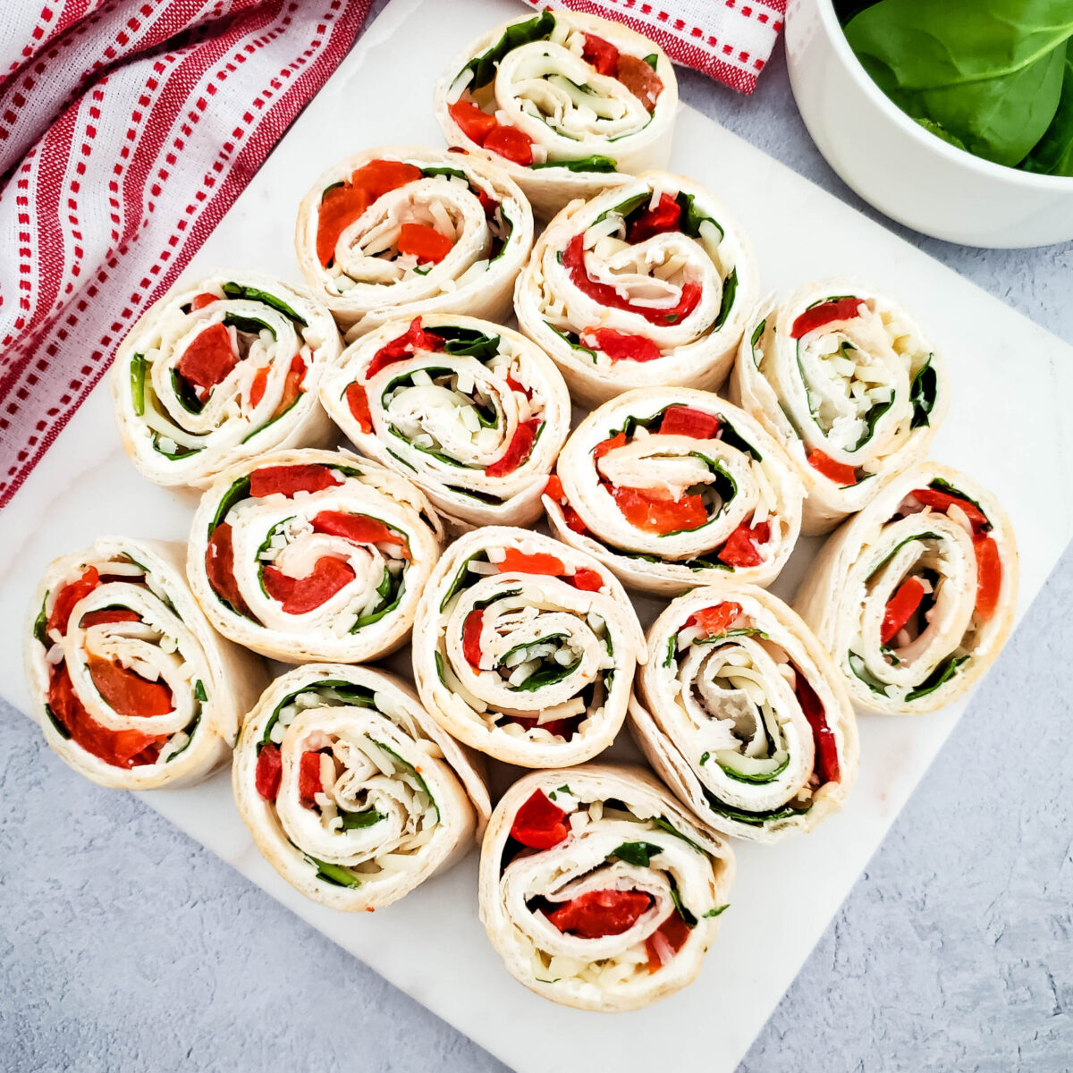 Roasted red pepper pinwheels with spinach