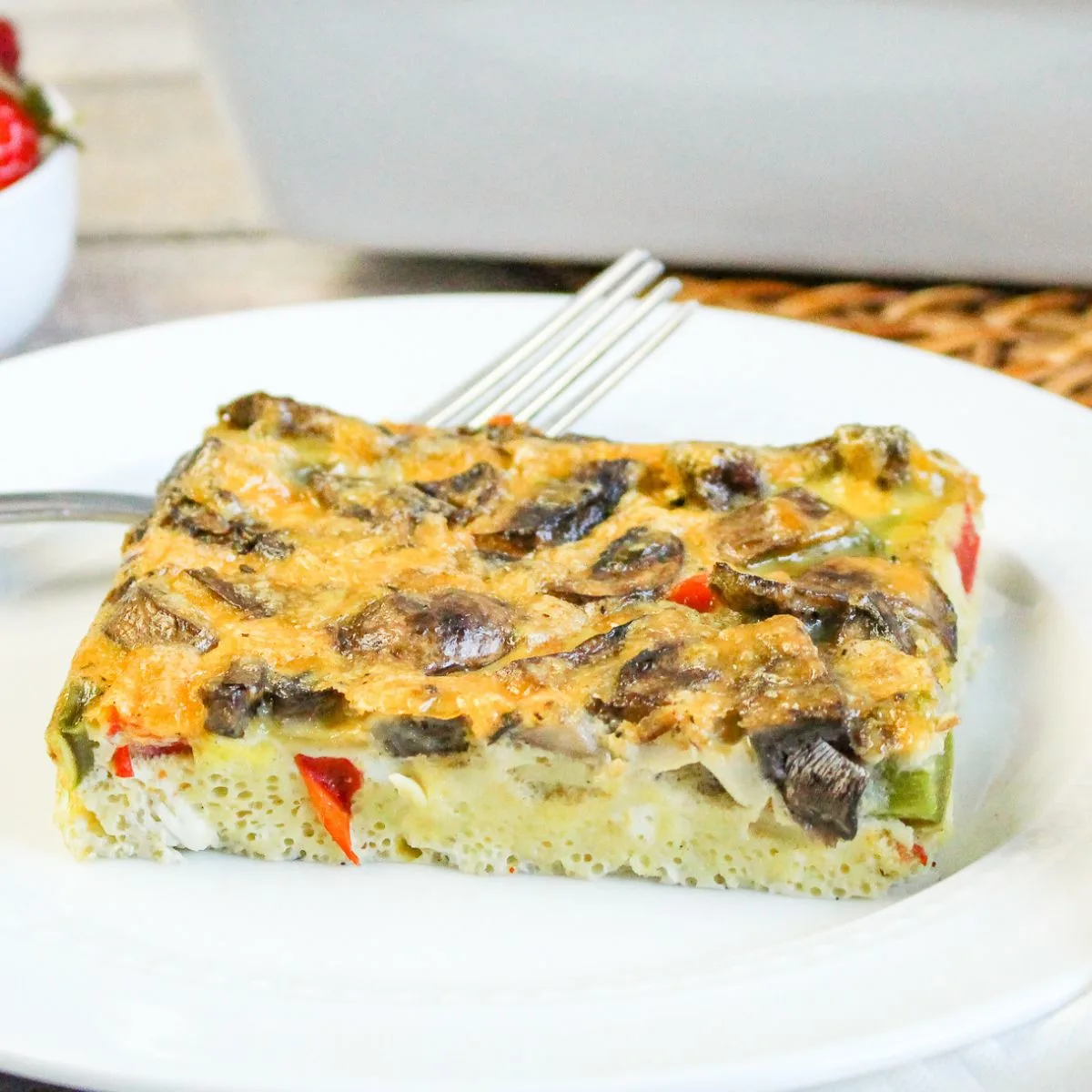vegetable breakfast casserole on white plate