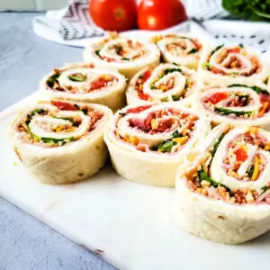 ham and turkey pinwheels with tomato lettuce and cheese