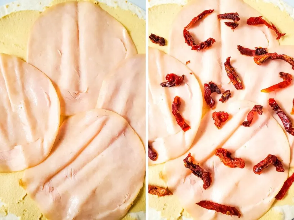 Spreading turkey and sun dried tomatoes on tortillas with hummus