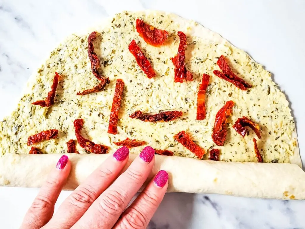 rolling sun dried tomato tortilla pinwheels