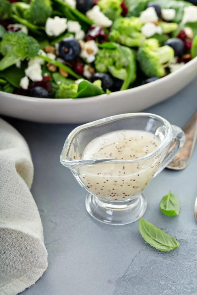 homemade poppy seed dressing in glass pourer