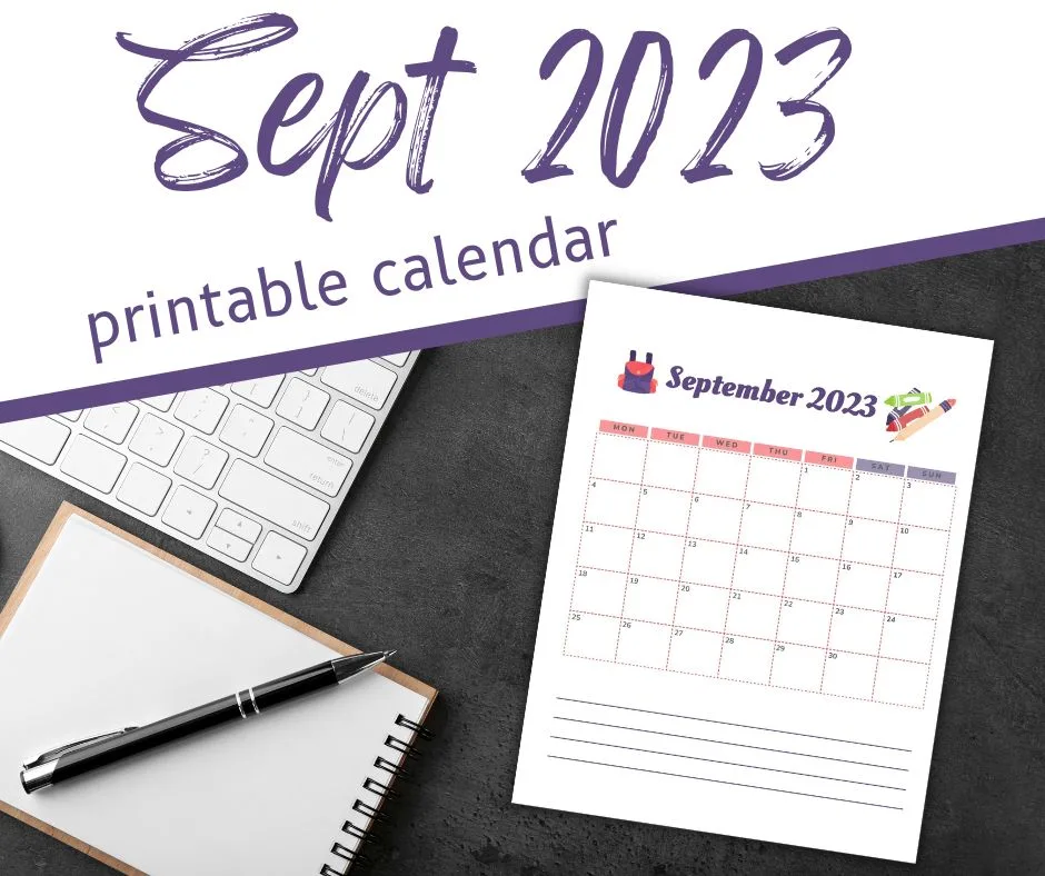 Sept 2023 printed calendar on gray desktop with laptop and pad