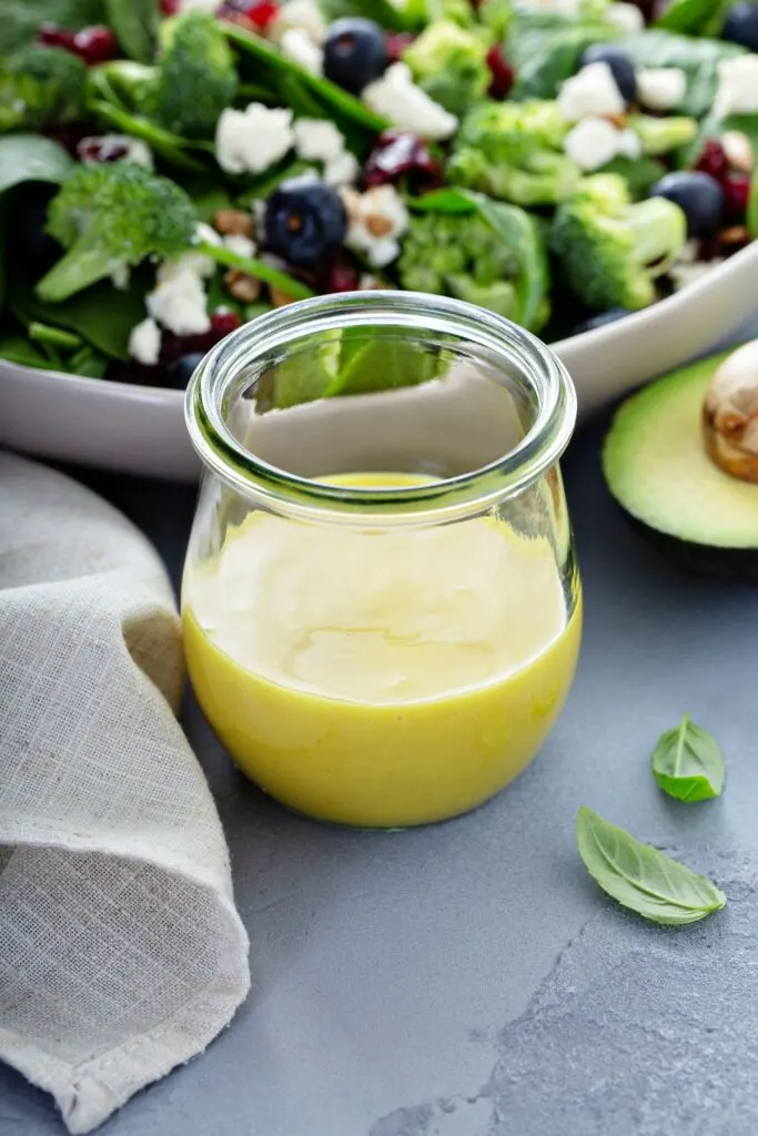 healthy mustard vinaigrette in clear glass jar