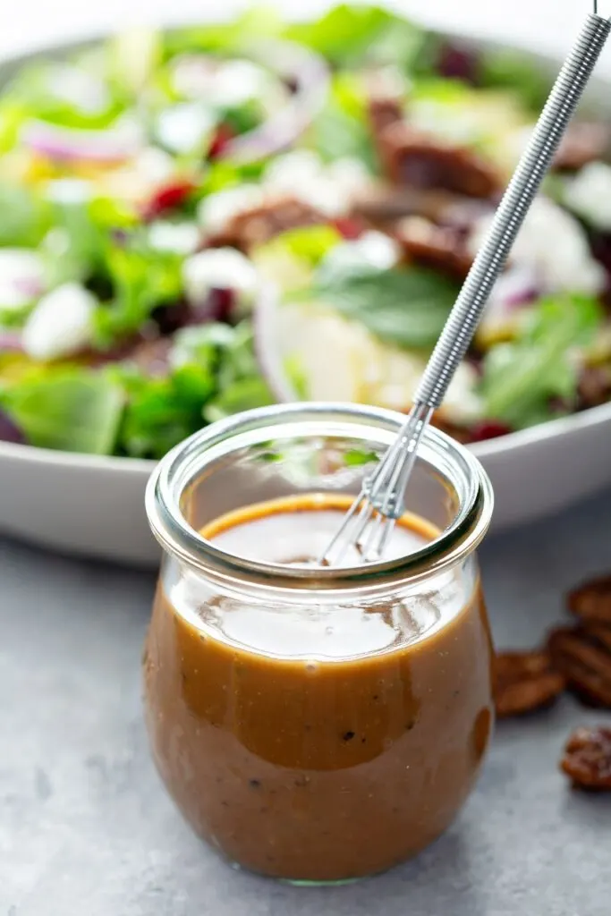 Balsamic Dressing in glass jar with whisk