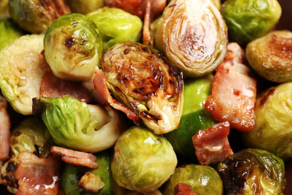 closeup brussels sprouts with bacon and shallots