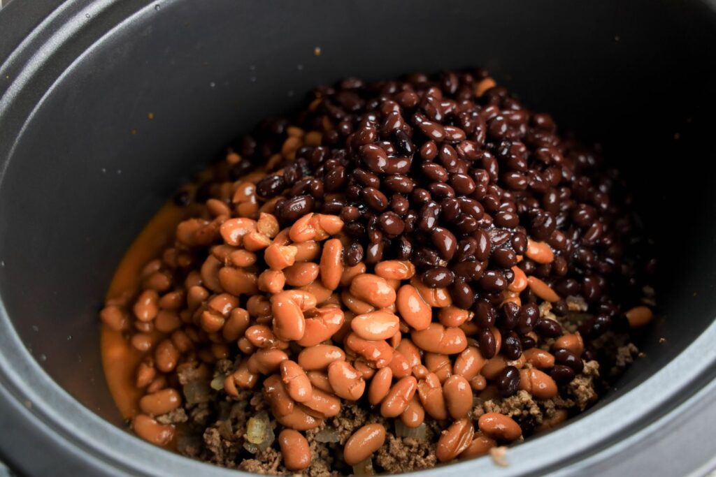 Adding two kinds of beans to crock pot for ground beef chili
