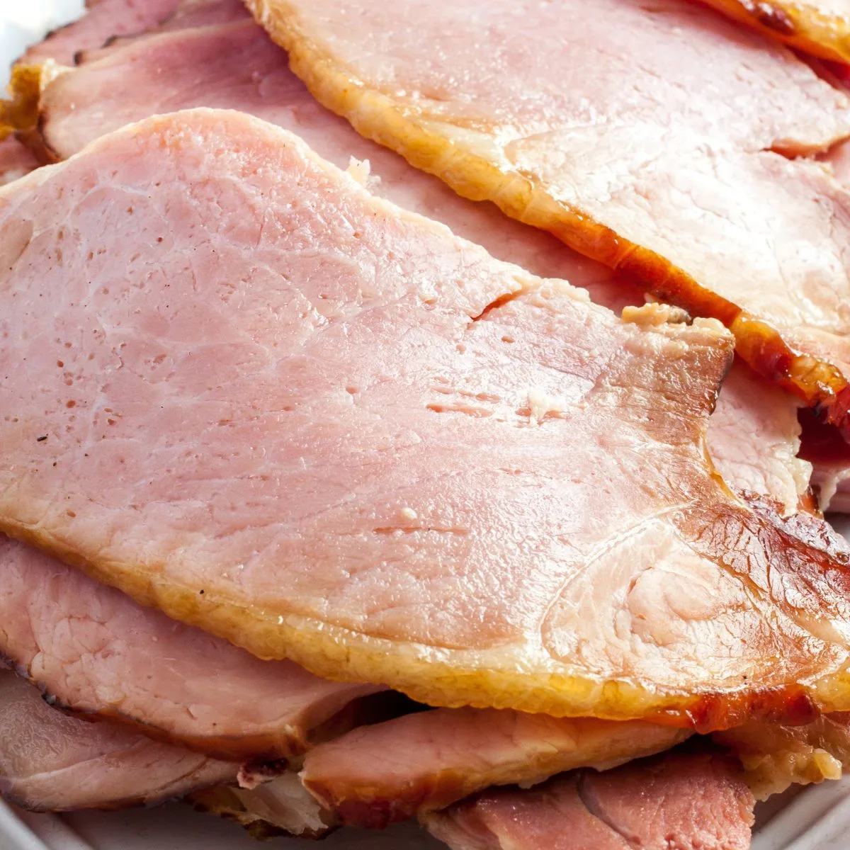sliced ham on white plate - ham leftovers